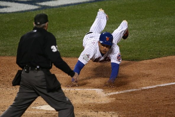 El dominicano  Juan Lagares marcó la sexta carrera de los Mets gracias a un sencillo de su compatriota Juan Uribe.